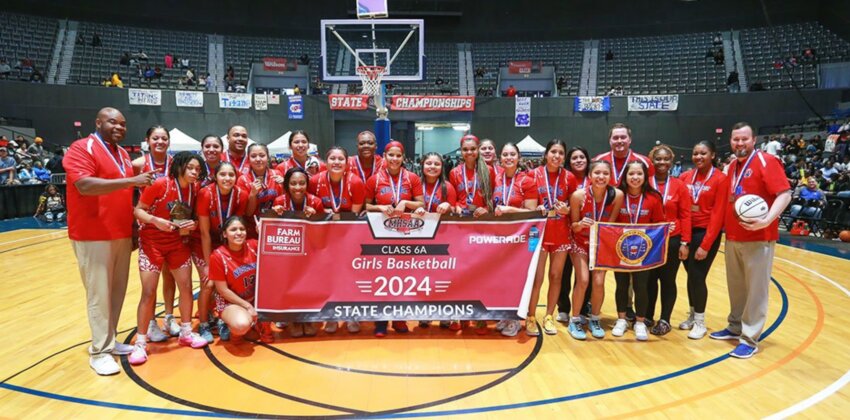 The Neshoba Central Lady Rockets pose for a photo after winning the 6A State Championship on Saturday.